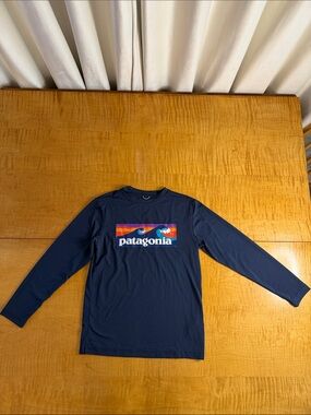 Patagonia Navy Long Sleeve Logo Shirt with Multicolor Stripe Graphic Capilene